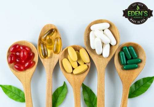 Supplements displayed in wooden spoons on table